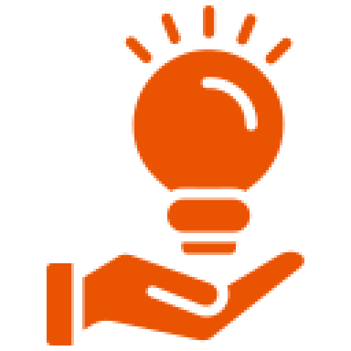 Hand holding a glowing light bulb.